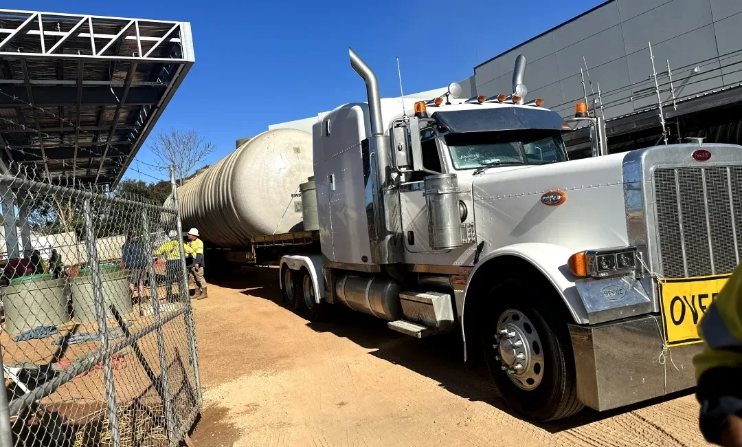 Enviro fuel tank truck delivering into Dubbo on an extendable dropdeck
