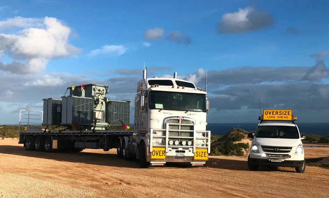 Truck delivering transformers from Melbourne to Port Headland with escorts